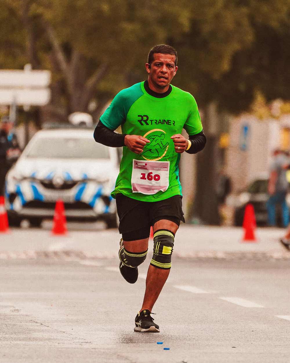 Man in Green Shirt running